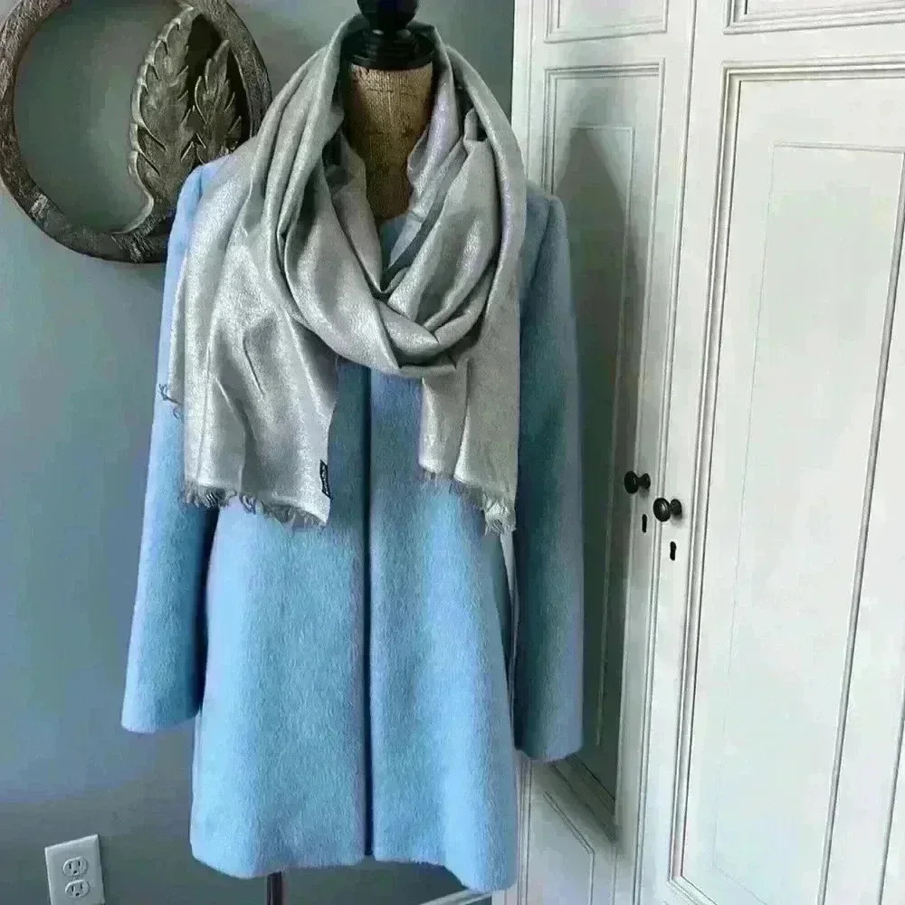 Tulle jr. Size L coat light blue